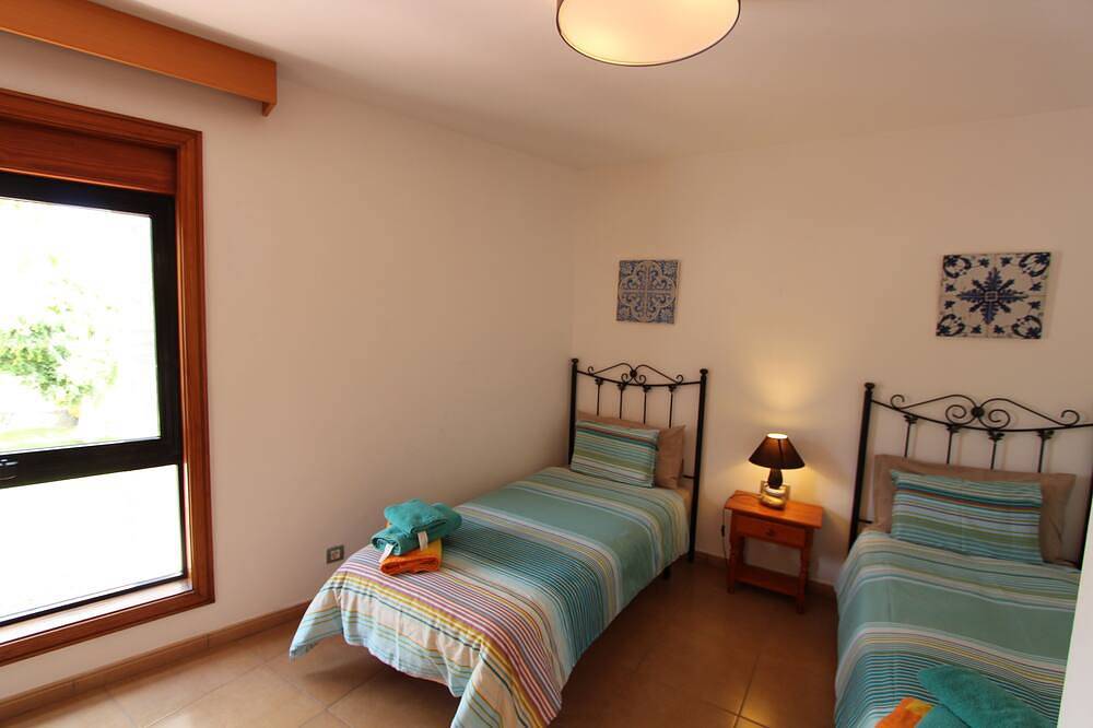 Villa with pool for exclusive group holiday under palm trees in Chayofa, Arona