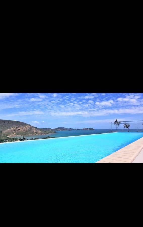 Gîte pour 6 personnes, avec vue ainsi que piscine et balcon à Nouméa