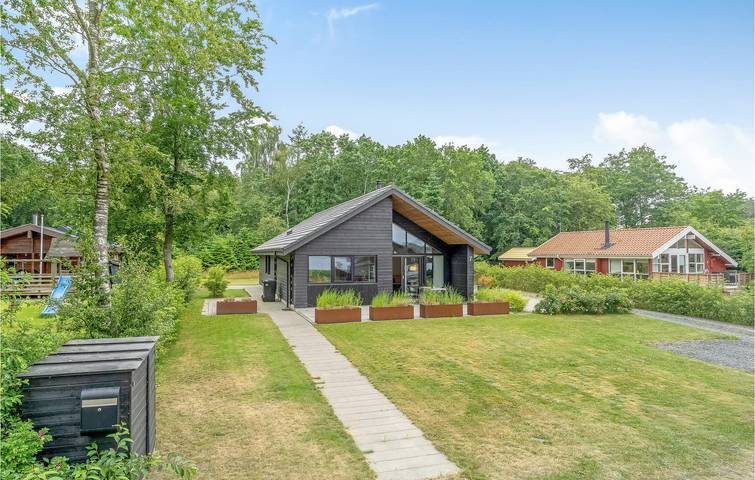 Ferienhaus für 4 Personen, mit Terrasse und Seeblick, mit Haustier