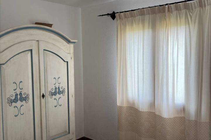 Casa Omar: Villa con Parco Giochi, Cucina Esterna e AC – 900m dal Mare in Porto Ainu, Budoni