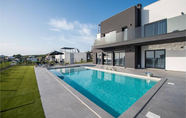 Charmant appartement avec vue sur la mer, piscine et parking, à 1,5 km du littoral in Novalja, Pag