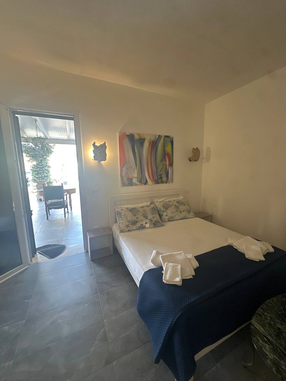 Chambre « Masseria Le Dimore, Stanza 4 » avec piscine partagée, Wi-Fi et climatisation in Baia Verde, Golfe de Tarente