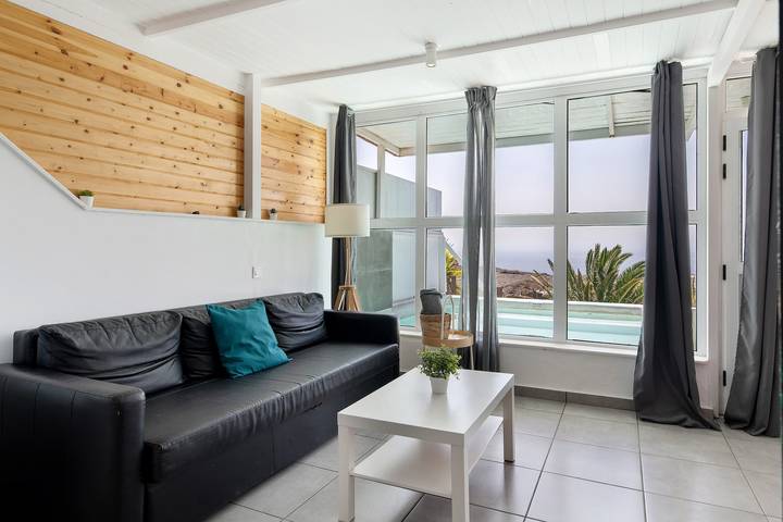 Casa vacanze 'Loft Amanecer' con vista mare, Wi-Fi e aria condizionata in Mácher, Tias