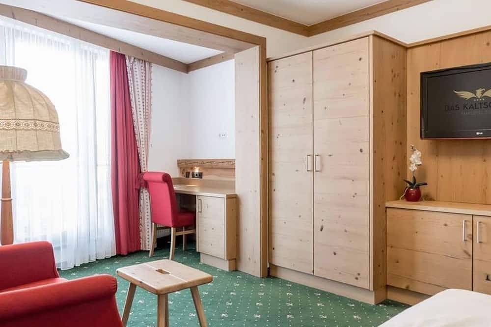 Einzelzimmer mit französischem Balkon - Das Kaltschmid - Familotel Tirol in Seefeld in Tirol, Innsbruck Land