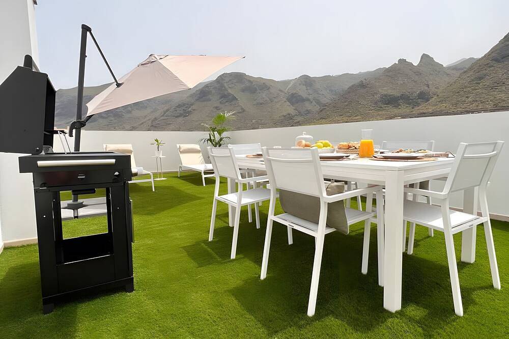 Ganze Wohnung, Ferienwohnung 'Apto Moderno Con Vistas Únicas' mit Meerblick, privater Terrasse und Wlan in Los Silos, Teneriffa Nord