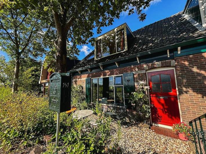 Location de vacances pour 4 personnes, avec vue sur le lac ainsi que jardin et vue à Alkmaar