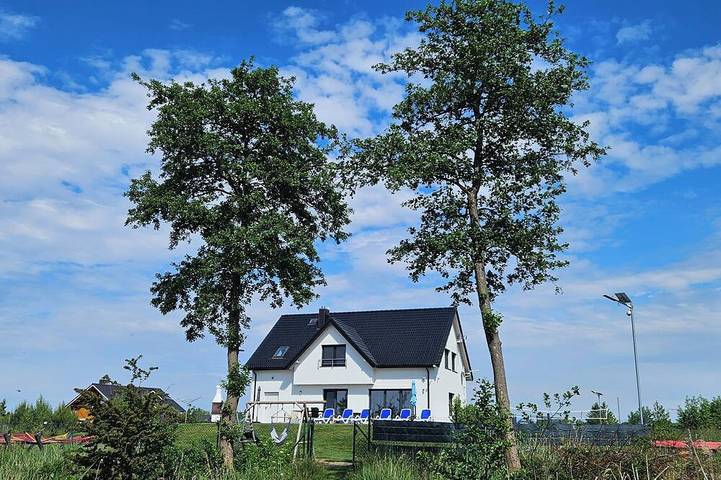 Ferienhaus für 12 Personen, mit Whirlpool und Terrasse sowie Garten und Sauna