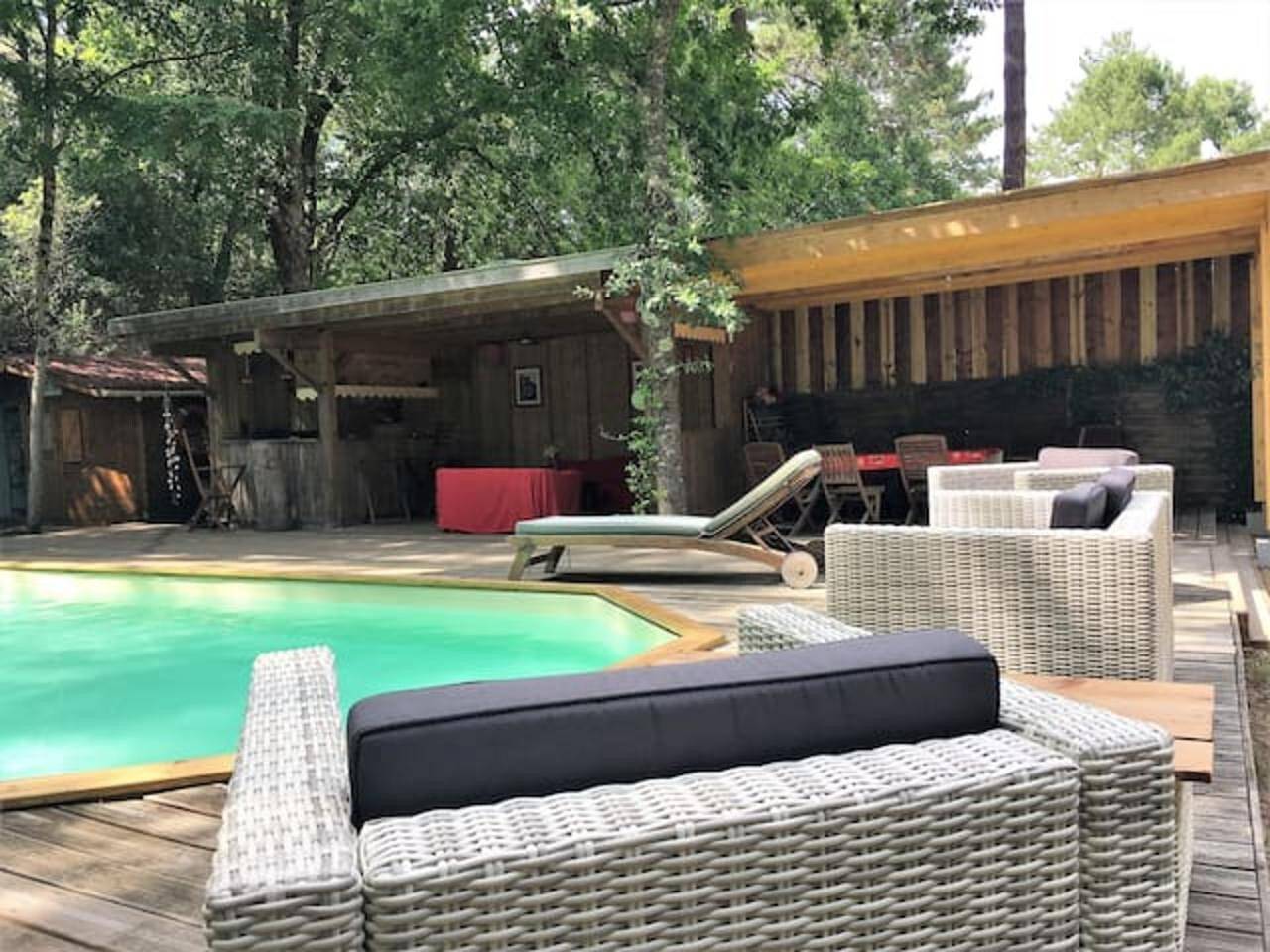 Chalet 'Cap Ferret Villa Grand Bois' avec piscine privée, terrasse privée et jardin privé in Petit Piquey, Lège-Cap-Ferret