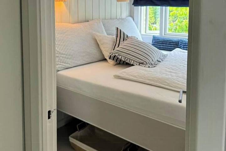 Ferienhaus in Sørland mit Bootsanlegestelle am Gamle Hellesund in Lillesand