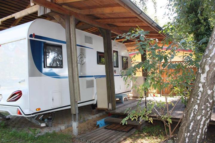 Bungalow für 4 Personen, mit Terrasse und Garten sowie Seeblick und Ausblick