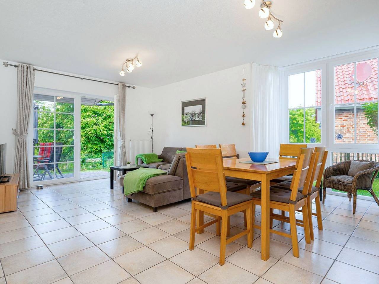 Ganze Ferienwohnung, Grachtenstube - Ferienwohnung direkt am Wasser in Greetsiel, Krummhörn