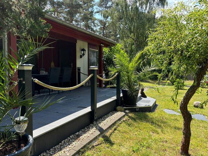 Ferienhaus für 4 Personen, mit Terrasse und Garten sowie Seeblick und Ausblick