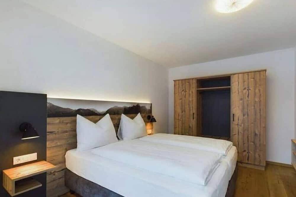 Ganze Wohnung, Alpenglühen Lodge Lechtal – Stilvolle Ferienwohnung mit Bergblick in Lechtaler Alpen, Bach