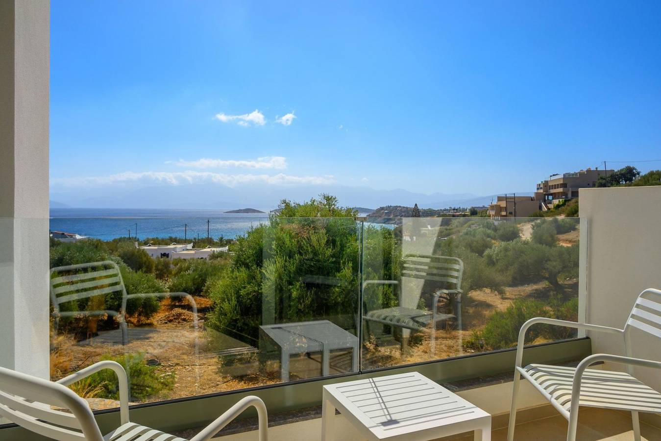 Entire apartment, Branch Suite w Shared Pool by Roots Suites in Lasithi