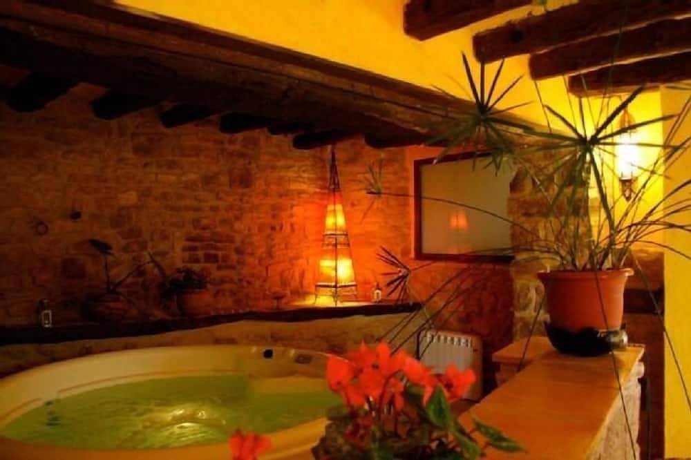 Landelijk appartement Les Cavallerisses voor 4 personen met jacuzzi in Les Piles, Tarragona Provincie