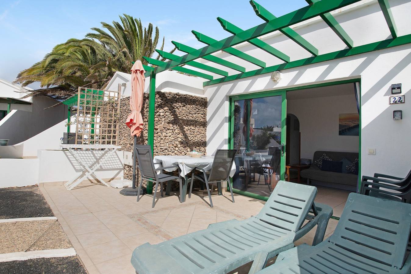 Appartamento intero, Appartamento "Jardin del Sol 22" vicino alla spiaggia con giardino privato e piscina condivisa in Playa Blanca, Yaiza