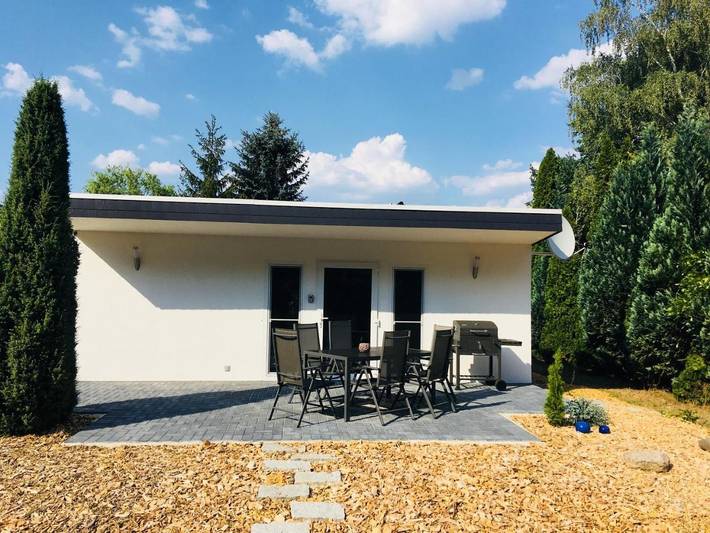 Ferienhaus für 7 Personen, mit Terrasse und Garten sowie Ausblick im Lausitzer Seenland