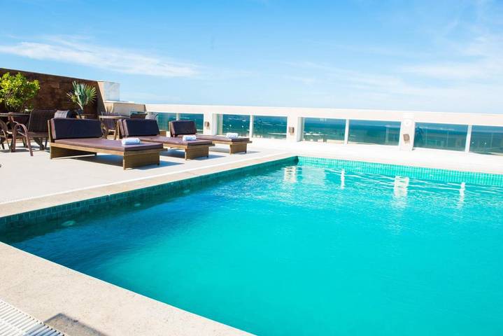 Pousadas para 3 pessoas, com vista e terraço e ainda sauna and piscina em Macaé