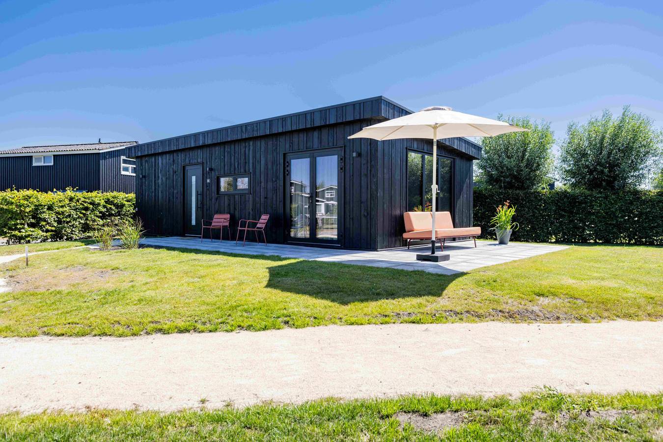 Charmantes 4P Ferienhaus mit Klimaanlage und Whirlpool direkt an den friesischen Seen. in Friesland