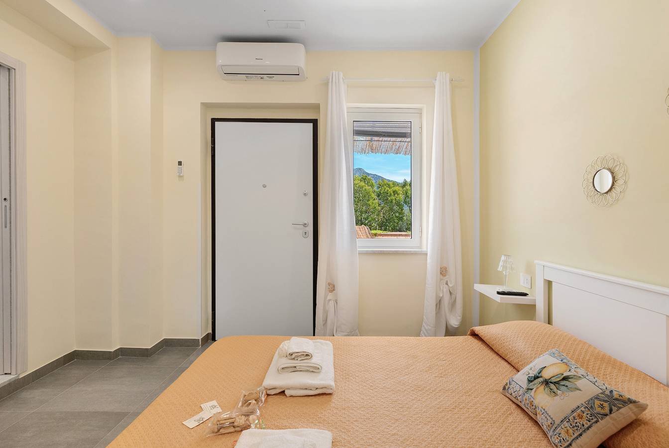 Chambre 'La Fiesta' avec vue sur la mer, Wi-Fi et climatisation in Capaccio, Cilento