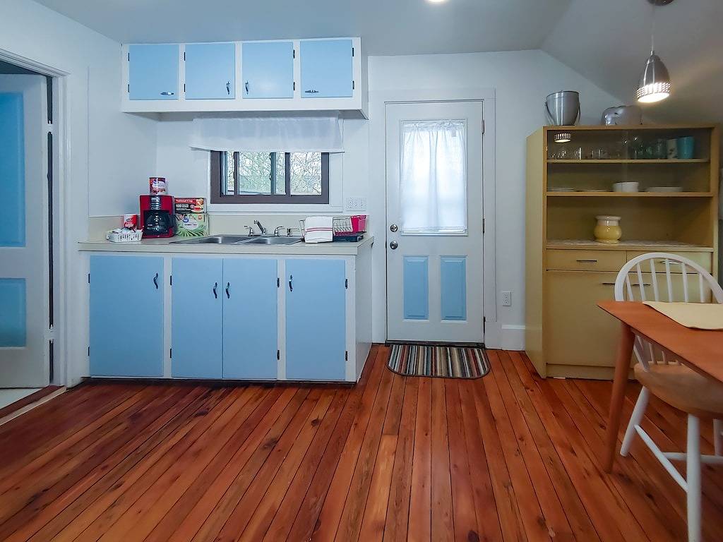 Downtown home blocks to the beach w/ king bed, deck fire pit & air conditioning in Manistee, Manistee County