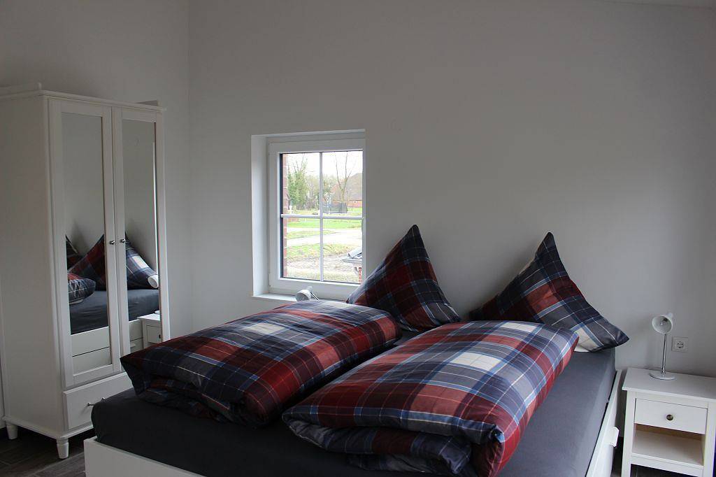 Cały apartament, Moderne Ferienwohnung Zum Stall für 4 Personen + Hund in Leybuchtpolder, Powiat Aurich