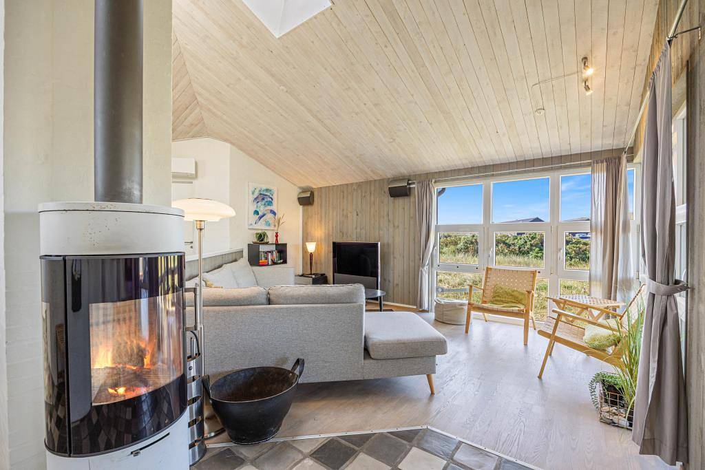 Stylish holiday home with wood-burning stove just 100 metres from the sea in Bjerregård, Holmsland Klit
