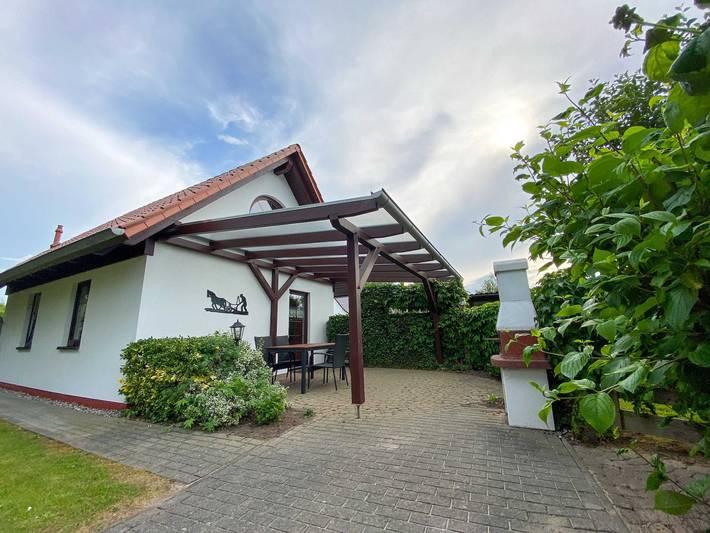 Ferienhaus für 4 Personen, mit Ausblick und Terrasse sowie Garten und Seeblick - 1