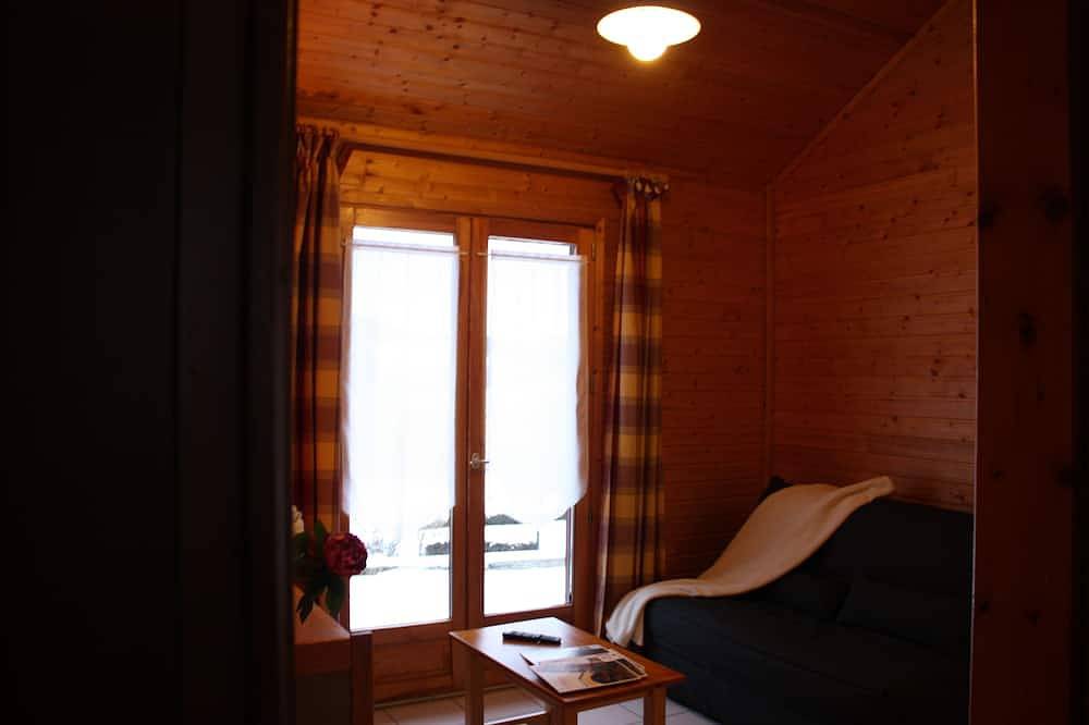 Village de 14 gîtes en chalets grand confort in Aydat, Parc naturel régional des Volcans d'Auvergne