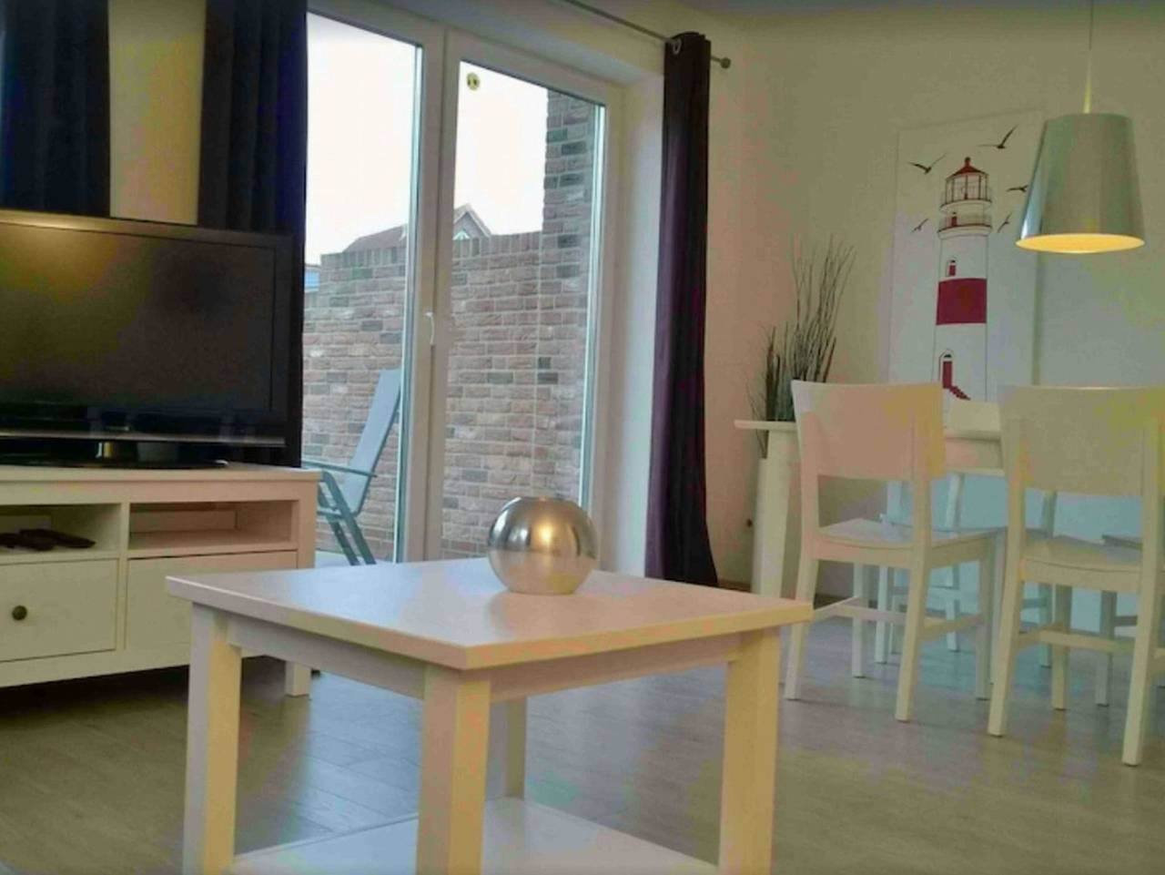 Ferienhaus Leuchtturm - Ferienhaus Leuchtturm in Horumersiel, Südliche Nordseeküste