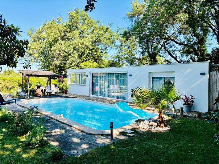 Appartement de vacances pour 2 personnes, avec Jacuzzi et Terrasse ainsi que Jardin et Piscine