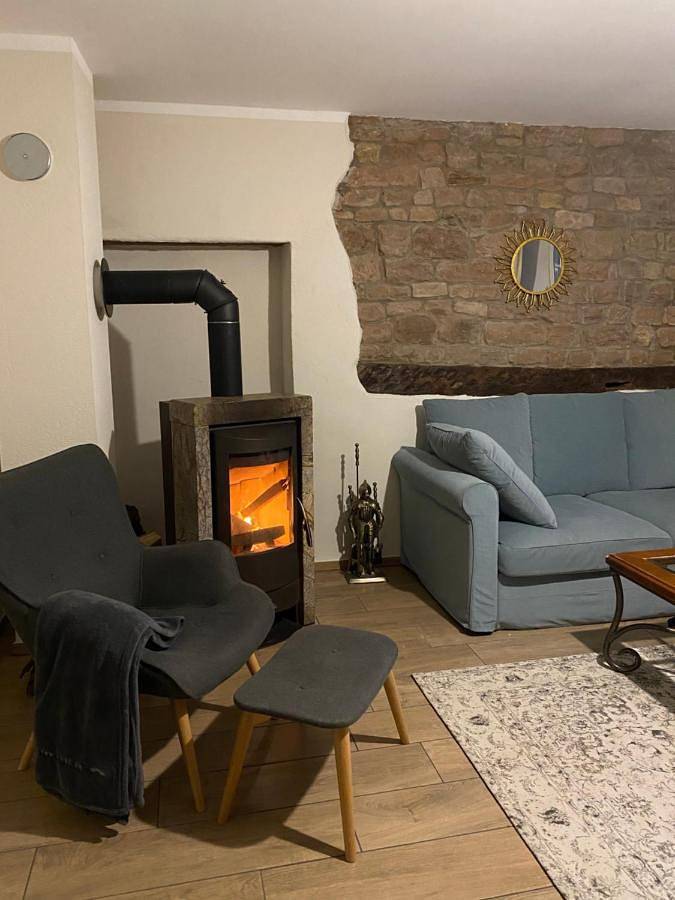 Ferienwohnung für 5 Personen, mit Ausblick und Sauna sowie Garten