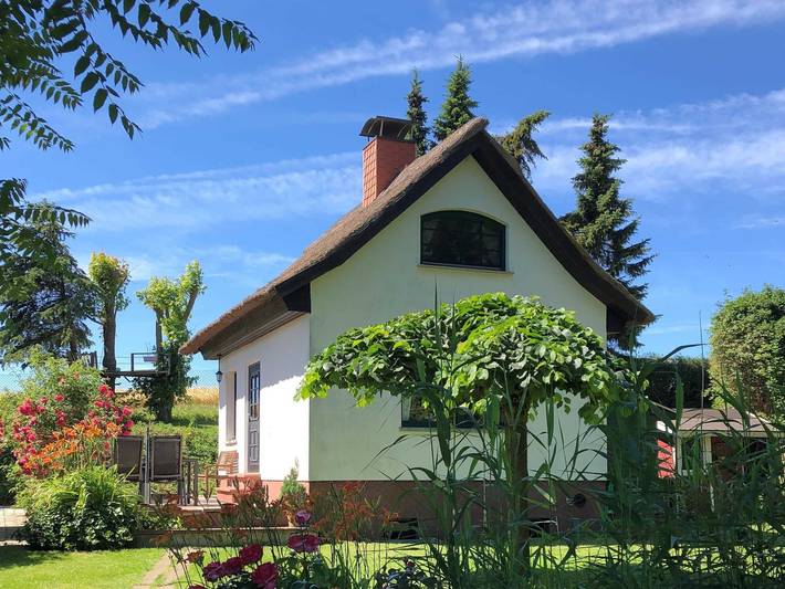 Ferienhaus für 5 Personen, mit Terrasse und Garten sowie Sauna und Seeblick in Barth