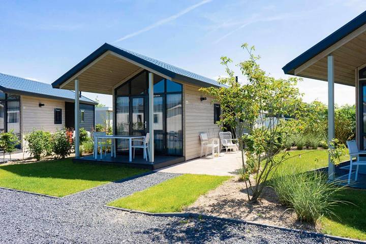 Ferienhaus für 4 Personen, mit Balkon/Terrasse und Terrasse sowie Garten