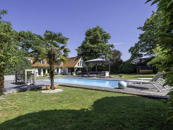 Maison de vacances pour 8 personnes, avec balcon et jardin ainsi que piscine et sauna