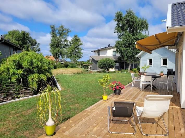 Ferienwohnung für 3 Personen, mit Terrasse und Garten sowie Ausblick