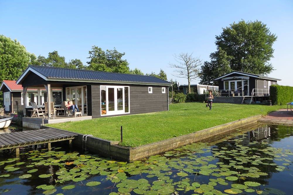 Gemütliches und rustikales Häuschen plus Hausboot auf dem Wasser in Regio Zwolle