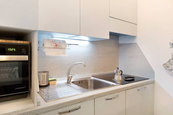 Appartamento intero, Casa Vacanze 'Super Mini Lanzada -' con Vista Montagna, Balcone e Wi-Fi in Lanzada (Borgo), Lanzada