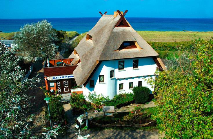 Ferienwohnung für 5 Personen, mit Balkon und Terrasse sowie Garten und Sauna im Dierhagen Ost