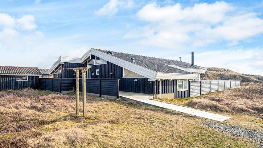 Ferienhaus für 10 Personen, mit Terrasse und Whirlpool sowie Sauna in Houvig