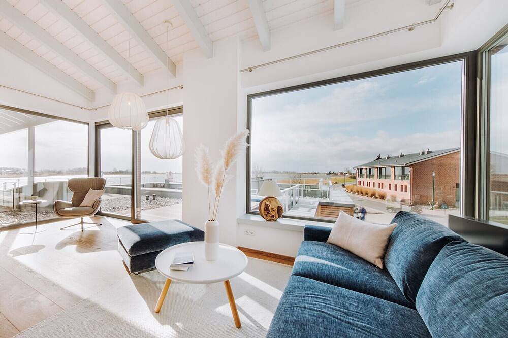 Entire apartment, Modern vacation apartment on the Bodden with sun terrace, sauna and fireplace in Waase, Ummanz