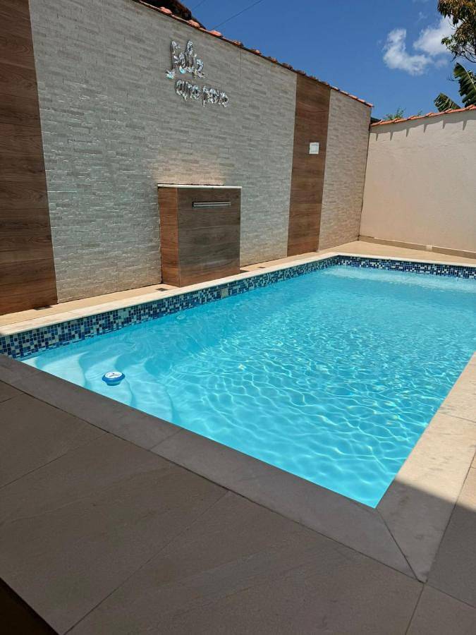 Casas e apartamentos de temporada para 8 pessoas, com balcão e vista e ainda piscina and jardim em Porto Novo