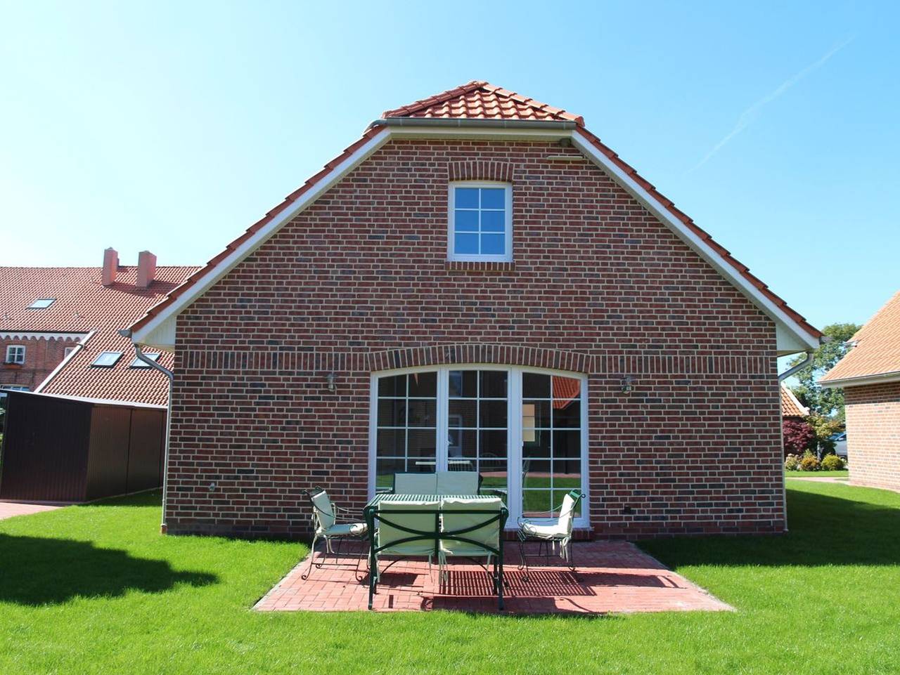 Hampton Huus - Hundefreundliches Ferienhaus (100qm) mit Sauna, Kamin und Garten für 6 Personen in Greetsiel, Krummhörn