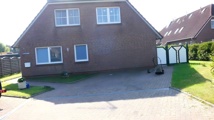 Apartamento inteiro, Apartamento 'Fewo Kroetje' com Terraço Privado e Wi-Fi in Greetsiel, Krummhorn