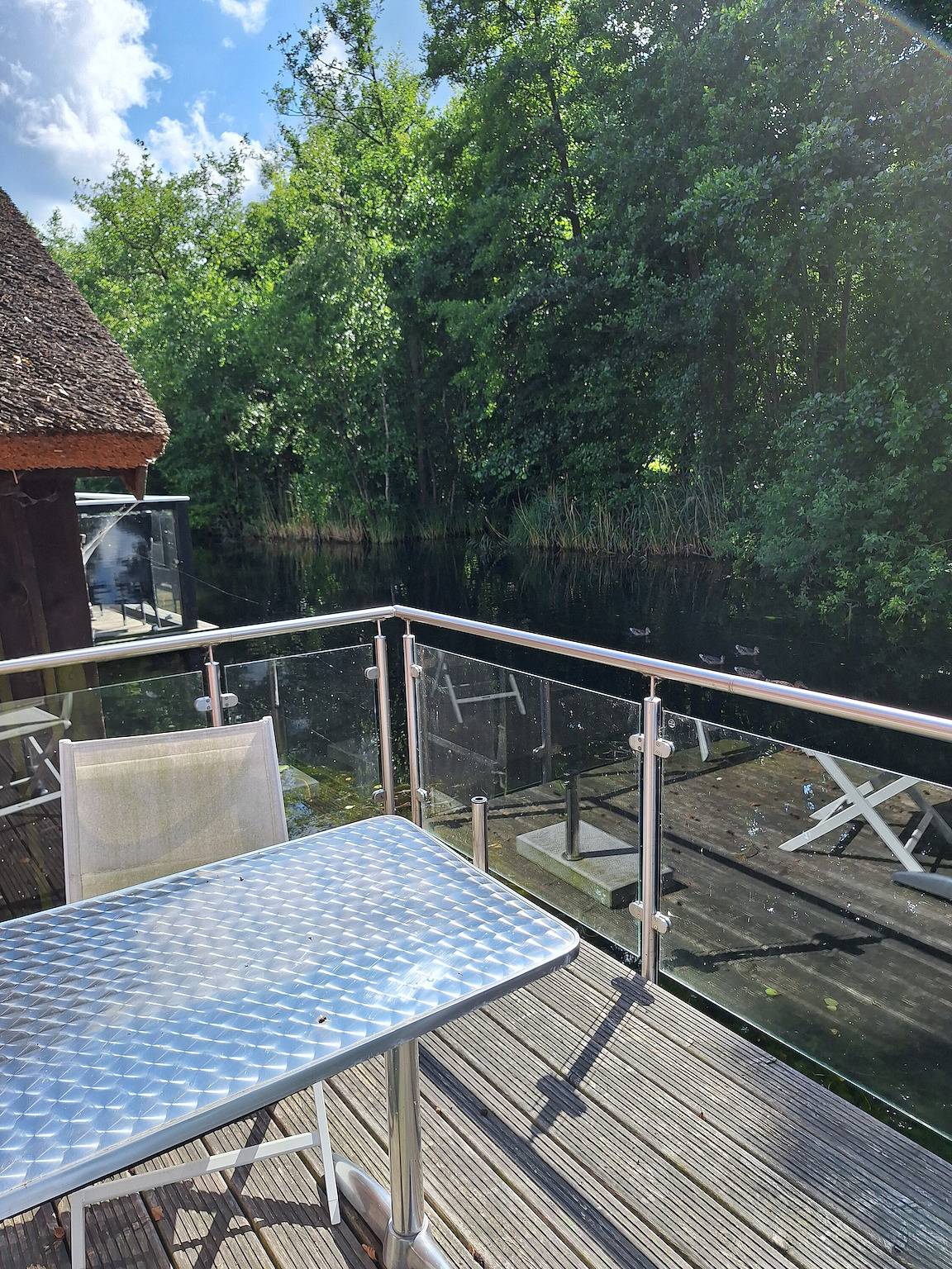 Ferienhaus 'Am Wasser, Bootshaus' mit privater Terrasse in Güstrow, Mecklenburgische Seenplatte