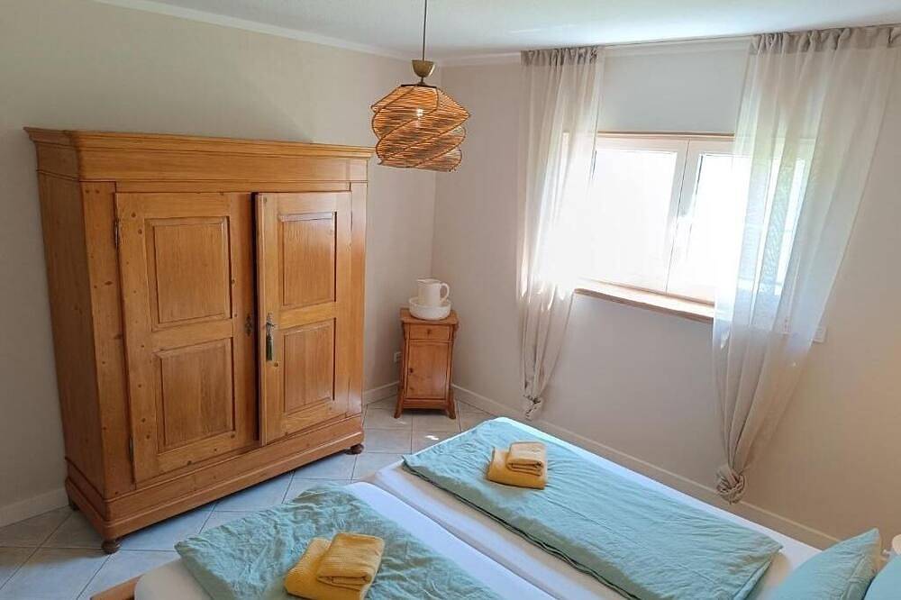 Ganze Wohnung, Gemütliche Ferienwohnung mit Fasssauna und Hot Tub in Laubach, Vogelsberg Region
