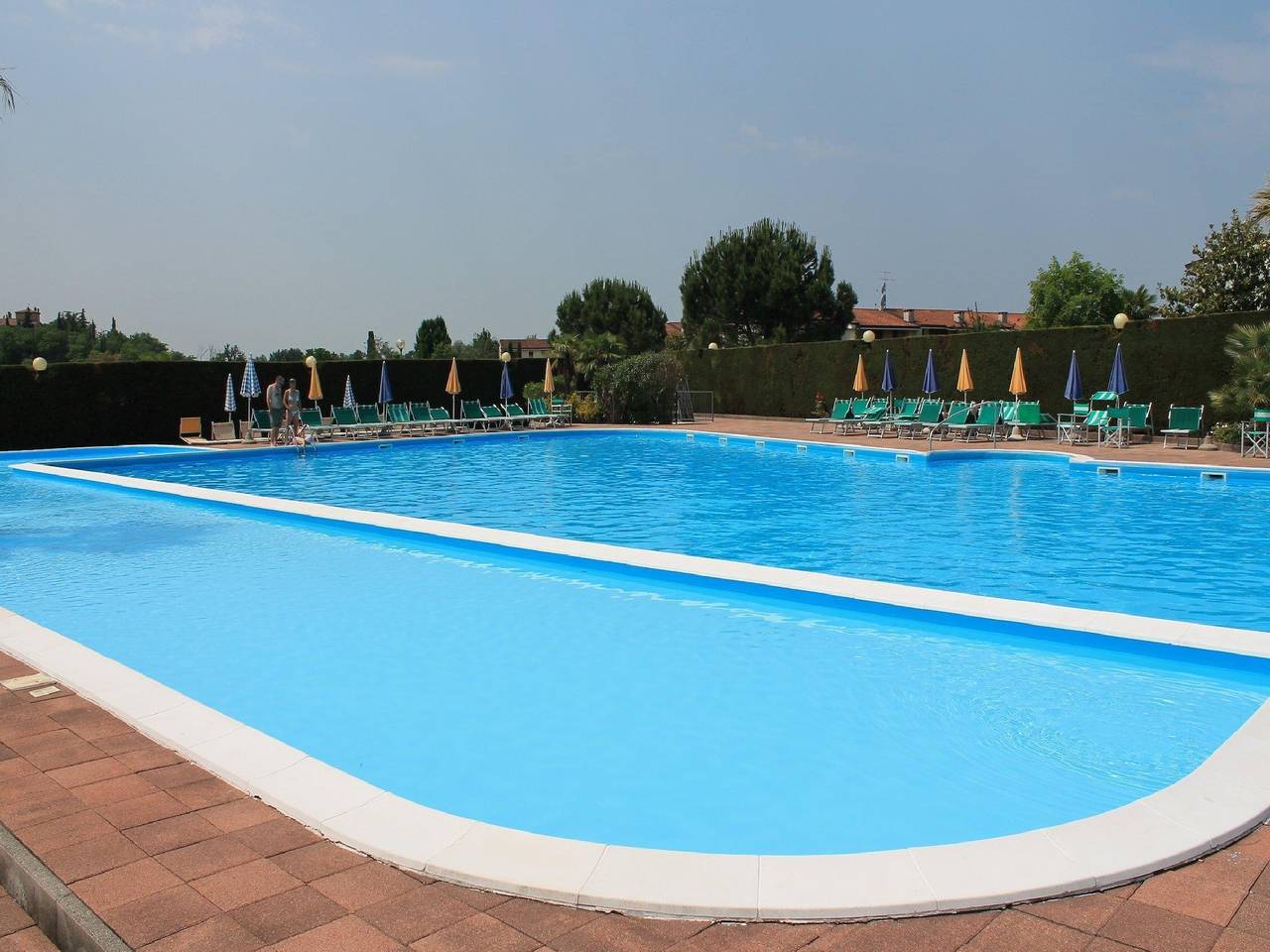 Charmante Ferienwohnung mit Pool in der Nähe von Lazise. Ideal für Familien. in Lazise, Gardasee-Berge