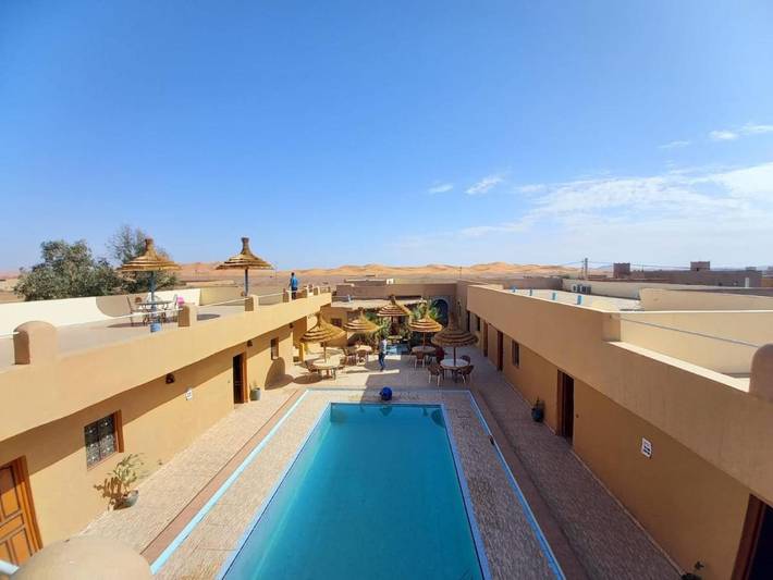Chambre d’hôte pour 4 personnes, avec piscine ainsi que vue et jardin, animaux acceptés dans Merzouga