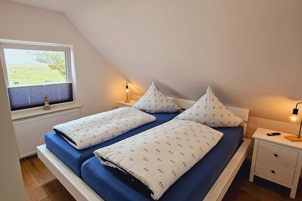 Ganze Wohnung, Apartment 'Matje' mit Seeblick, gemeinsamer Terrasse und Wlan in Langeneß, Halligen
