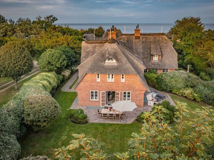 Ferienhaus mit Meerblick für 8 Personen, mit Terrasse und Garten sowie Sauna
